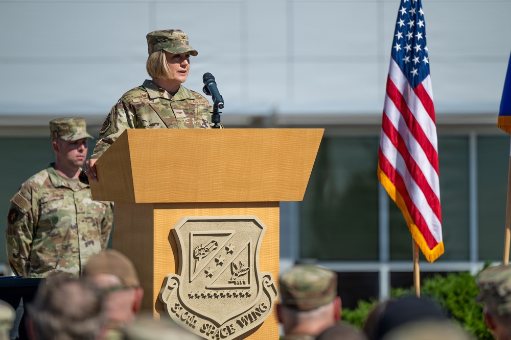 Col. Melissa Burton delivers her first remarks as the 310th Space Wing commander