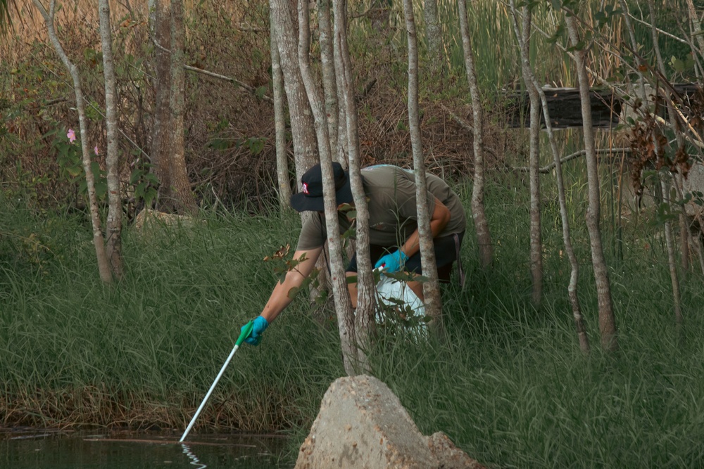 Sailors, retirees, and civilians from around the base volunteered to remove trash and other debris along the St. Johns River shoreline