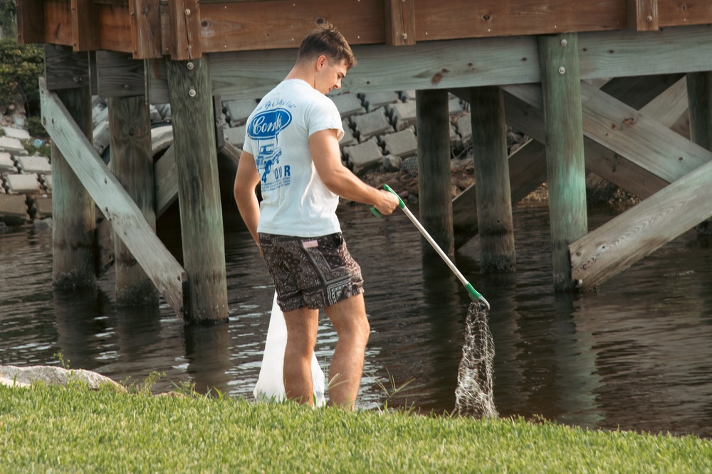Sailors, retirees, and civilians from around the base volunteered to remove trash and other debris along the St. Johns River shoreline