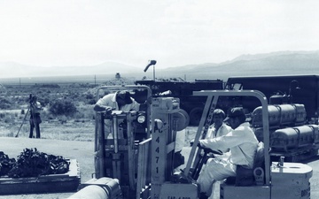 Tooele Ordnance Depot Personnel Handle Munitions Canisters with Forklift at Tooele Ordnance Depot