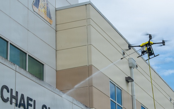 Demonstration of an Apellix B2 pressure washing drone to Naval Air Station Jacksonville leadership