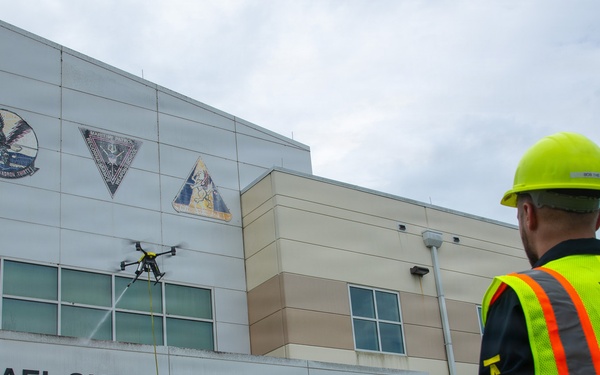 Demonstration of an Apellix B2 pressure washing drone to Naval Air Station Jacksonville leadership