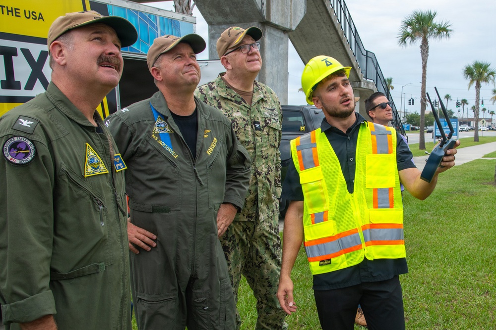 Demonstration of an Apellix B2 pressure washing drone to Naval Air Station Jacksonville leadership