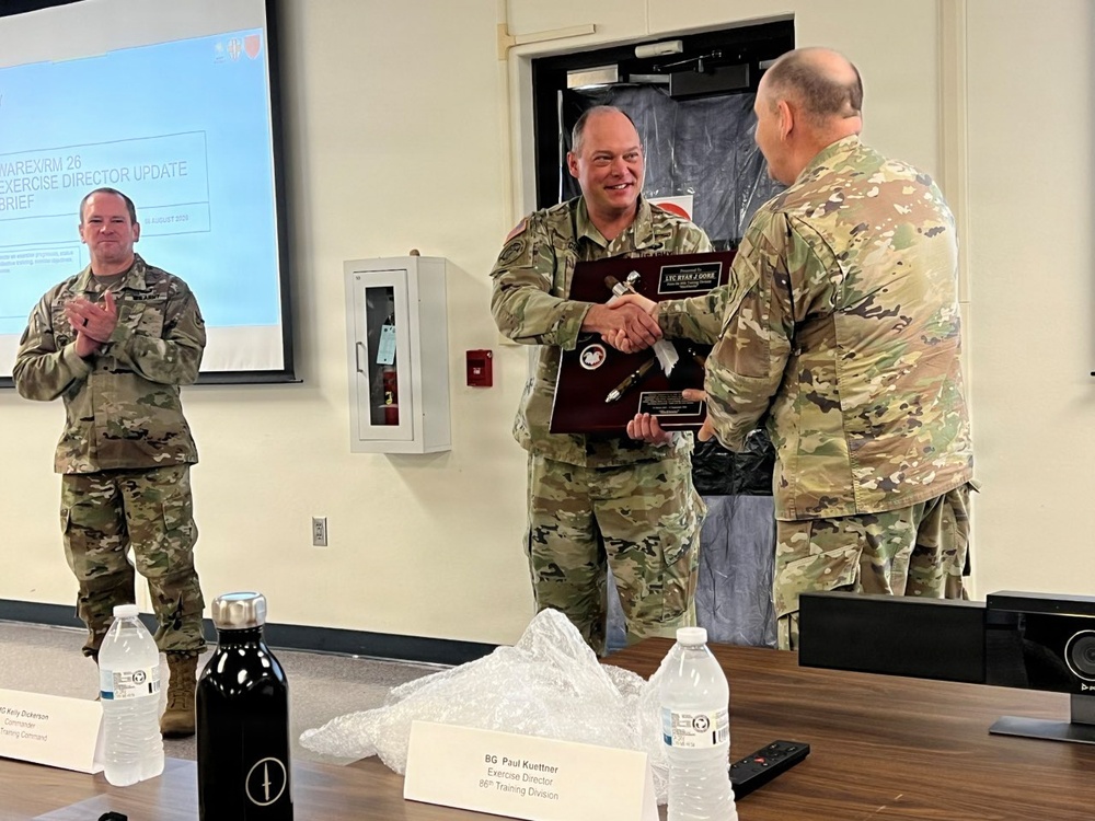 Lt. Col. Ryan Gore Receives Coveted Blackhawks Double Tomahawks Plaque.