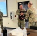Lt. Col. Ryan Gore Receives Coveted Blackhawks Double Tomahawks Plaque.