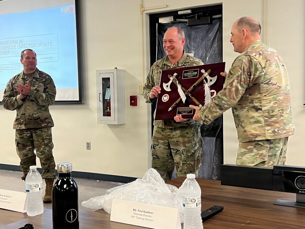 Lt. Col. Ryan Gore Receives Coveted Blackhawks Double Tomahawks Plaque.