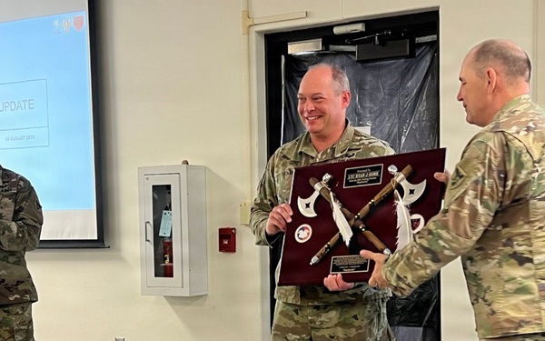 Lt. Col. Ryan Gore Receives Coveted Blackhawks Double Tomahawks Plaque.