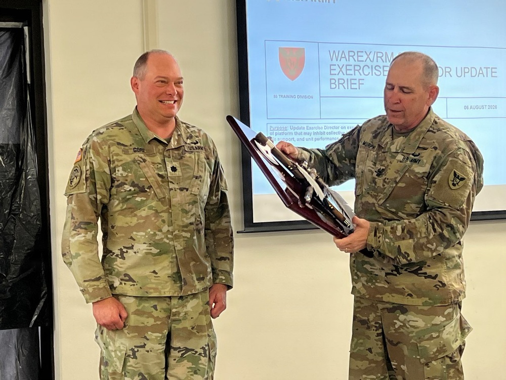 Lt. Col. Ryan Gore Receives Coveted Blackhawks Double Tomahawks Plaque.