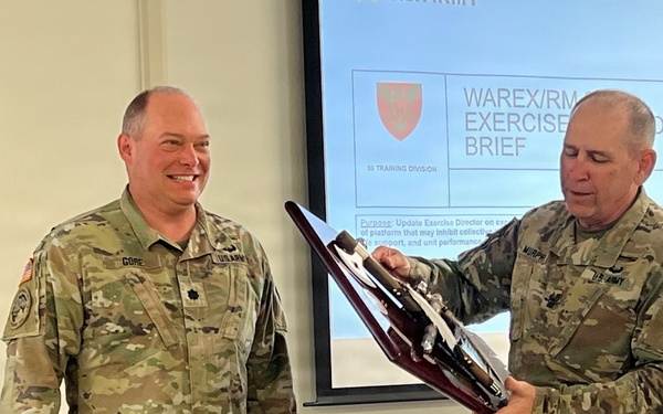 Lt. Col. Ryan Gore Receives Coveted Blackhawks Double Tomahawks Plaque.