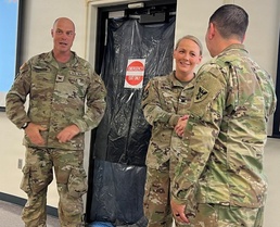 Lt. Col. Jen Meadows Receives Valued 86th Blackhawks Coin!
