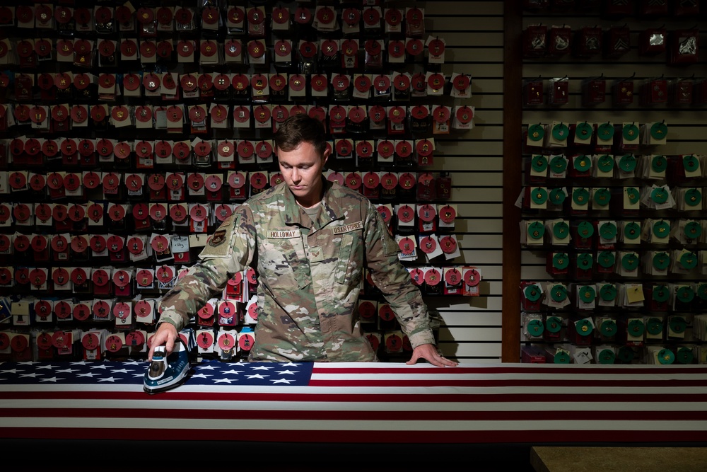 U.S. Air Force Senior Airman Jesse Holloway, Air Force Mortuary Affairs Operations uniforms specialist