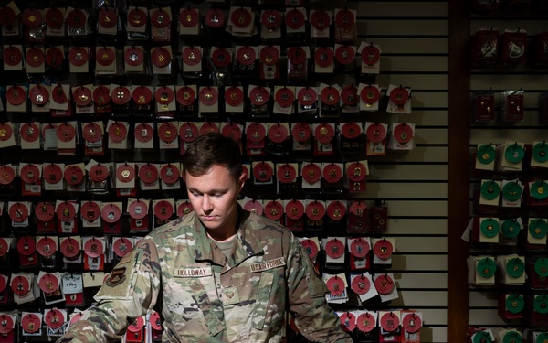 U.S. Air Force Senior Airman Jesse Holloway, Air Force Mortuary Affairs Operations uniforms specialist