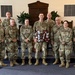 Logistics Officer Receives Blackhawks Double Tomahawks Plaque