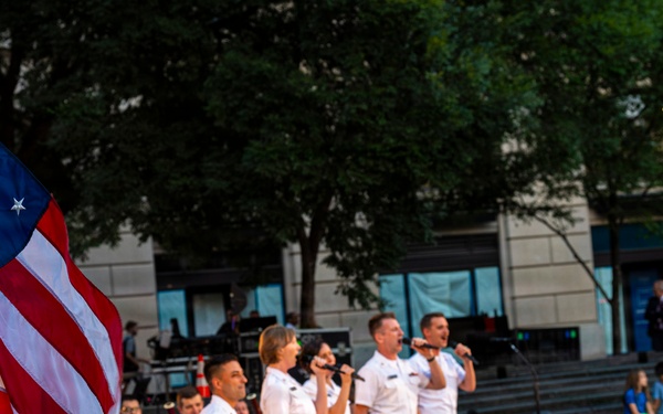 The United States Navy Band performs its Concert on the Avenue at the Navy Memorial