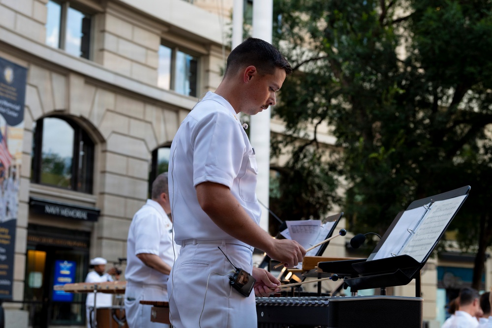 The United States Navy Band performs its Concert on the Avenue at the Navy Memorial