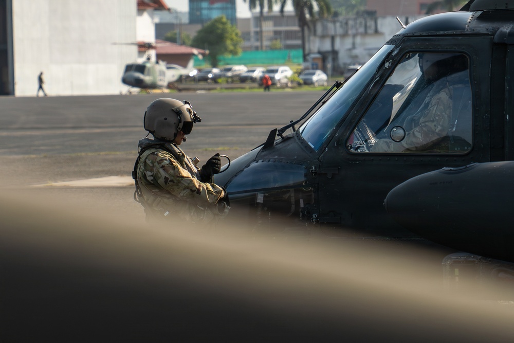 Joint Task Force-Bravo’s 1st Battalion, 228th Aviation Regiment conducts a tactical flyover during PANAMAX 2026’s distinguished visitors day
