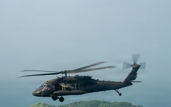 Joint Task Force-Bravo’s 1st Battalion, 228th Aviation Regiment conducts a tactical flyover during PANAMAX 2026’s distinguished visitors day