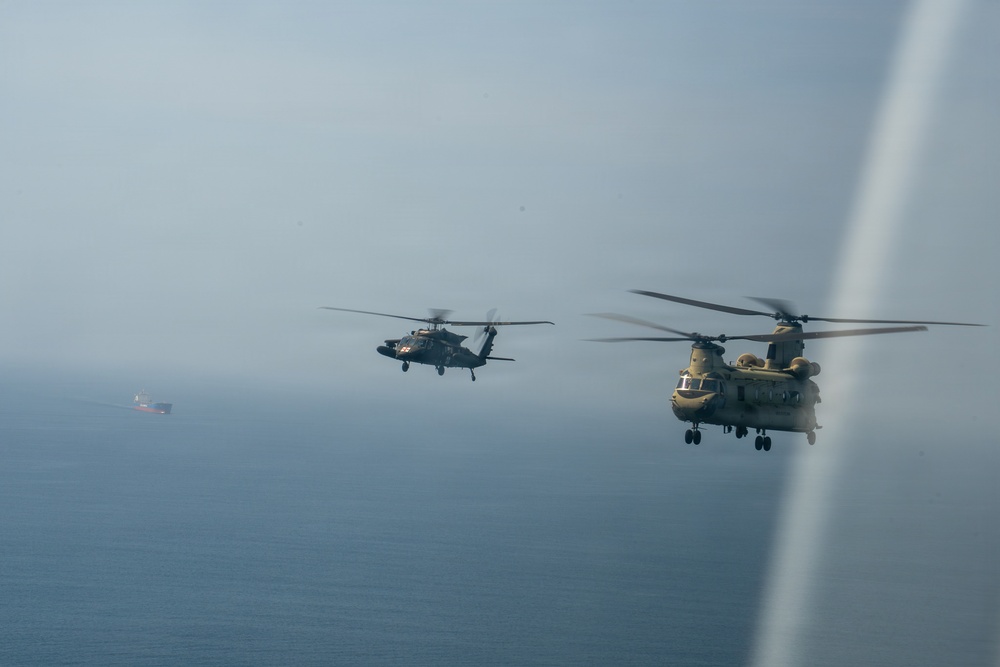 Joint Task Force-Bravo’s 1st Battalion, 228th Aviation Regiment conducts a tactical flyover during PANAMAX 2026’s distinguished visitors day