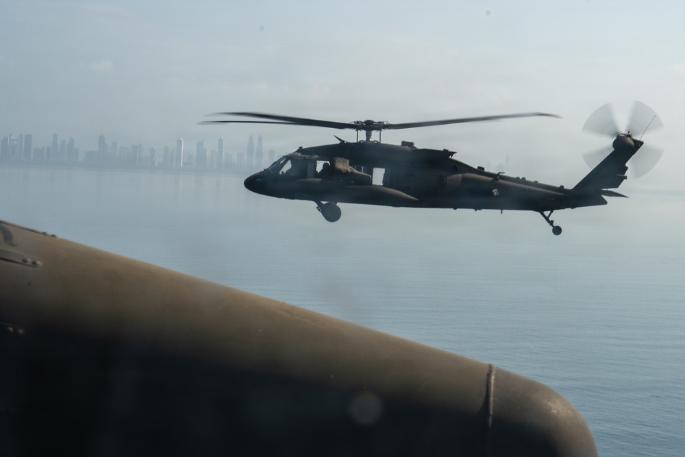 Joint Task Force-Bravo’s 1st Battalion, 228th Aviation Regiment conducts a tactical flyover during PANAMAX 2026’s distinguished visitors day