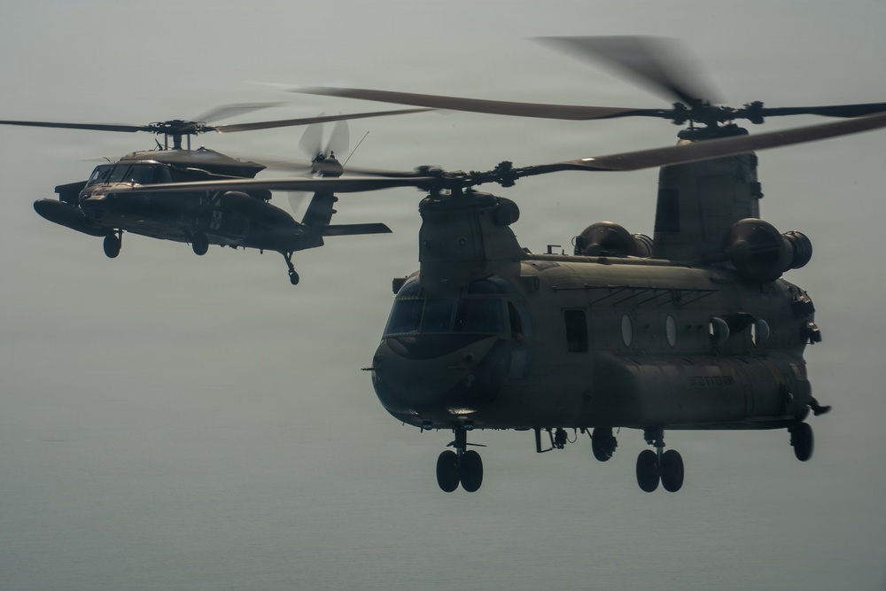 Joint Task Force-Bravo’s 1st Battalion, 228th Aviation Regiment conducts a tactical flyover during PANAMAX 2026’s distinguished visitors day