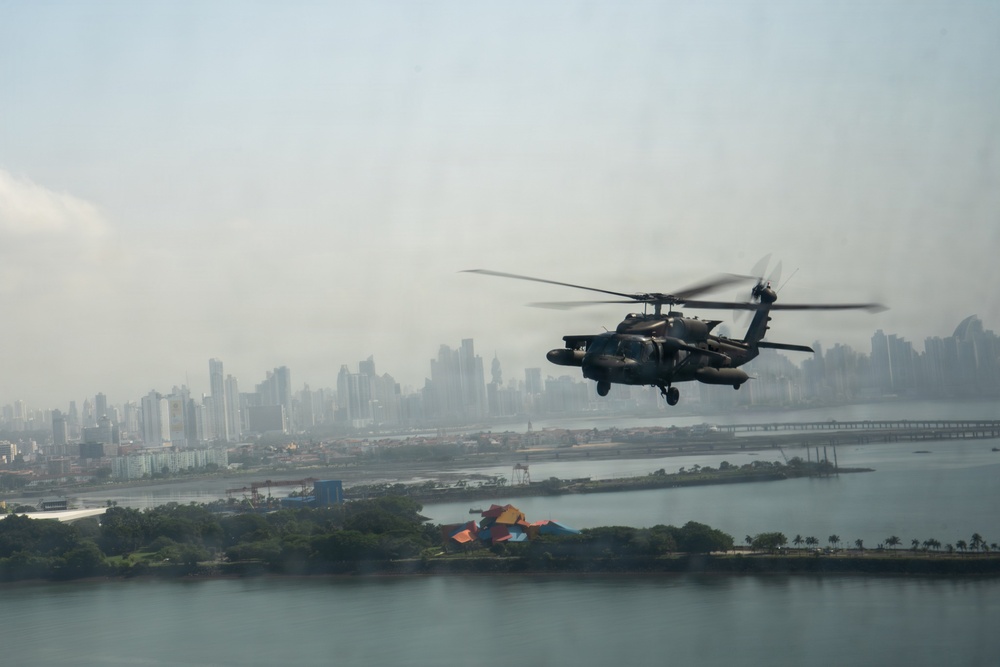 Joint Task Force-Bravo’s 1st Battalion, 228th Aviation Regiment conducts a tactical flyover during PANAMAX 2026’s distinguished visitors day