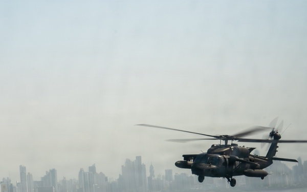 Joint Task Force-Bravo’s 1st Battalion, 228th Aviation Regiment conducts a tactical flyover during PANAMAX 2026’s distinguished visitors day