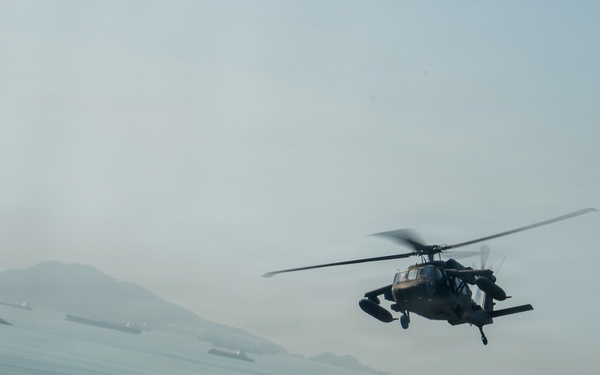 Joint Task Force-Bravo’s 1st Battalion, 228th Aviation Regiment conducts a tactical flyover during PANAMAX 2026’s distinguished visitors day