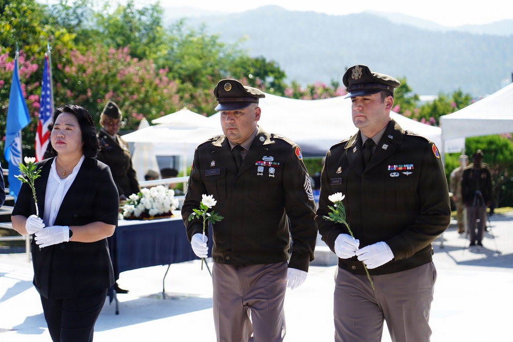 Flower-laying honors the fallen of Hill 303