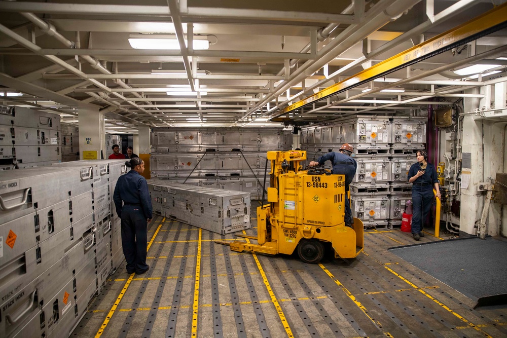 George Washington Sailors Handle Ordnance