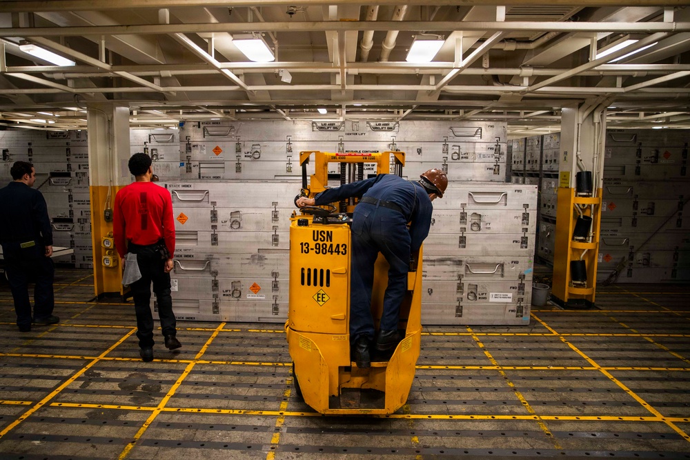 George Washington Sailors Handle Ordnance