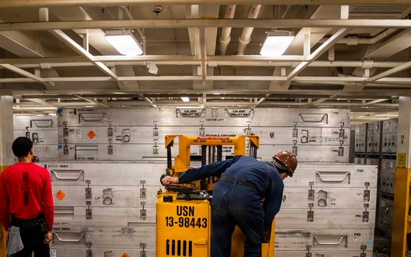 George Washington Sailors Handle Ordnance