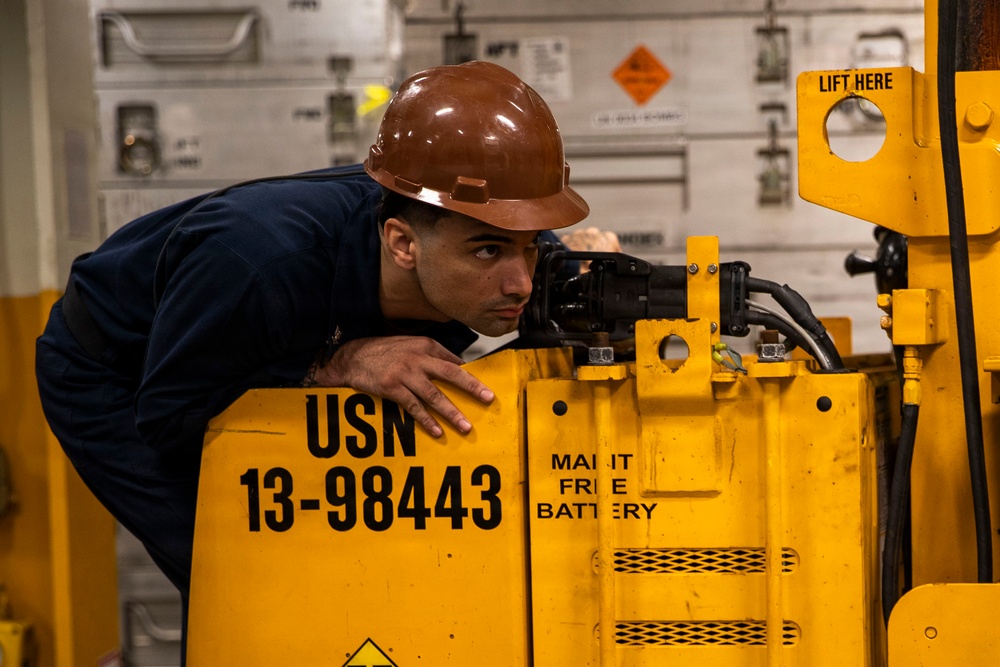 George Washington Sailors Handle Ordnance