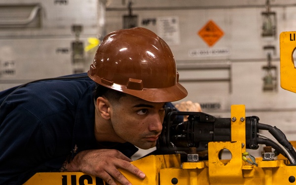 George Washington Sailors Handle Ordnance
