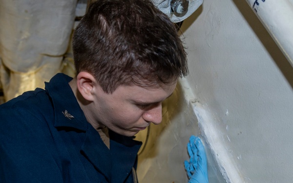 Delbert D. Black Sailors Conduct Preventative Maintenance