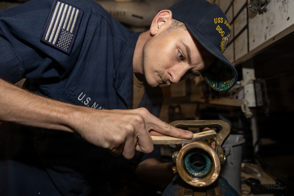 John Paul Jones Sailor Conducts Maintenance