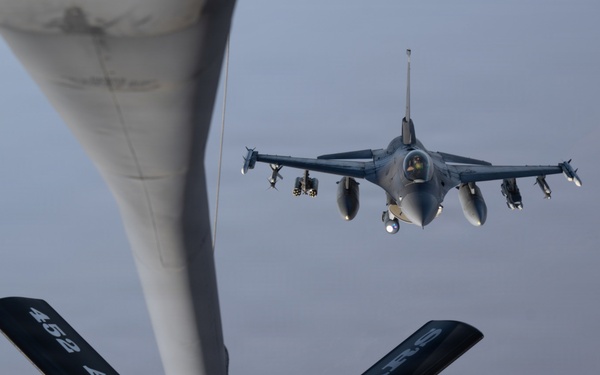KC-135 refuels F-16s in support of regional security