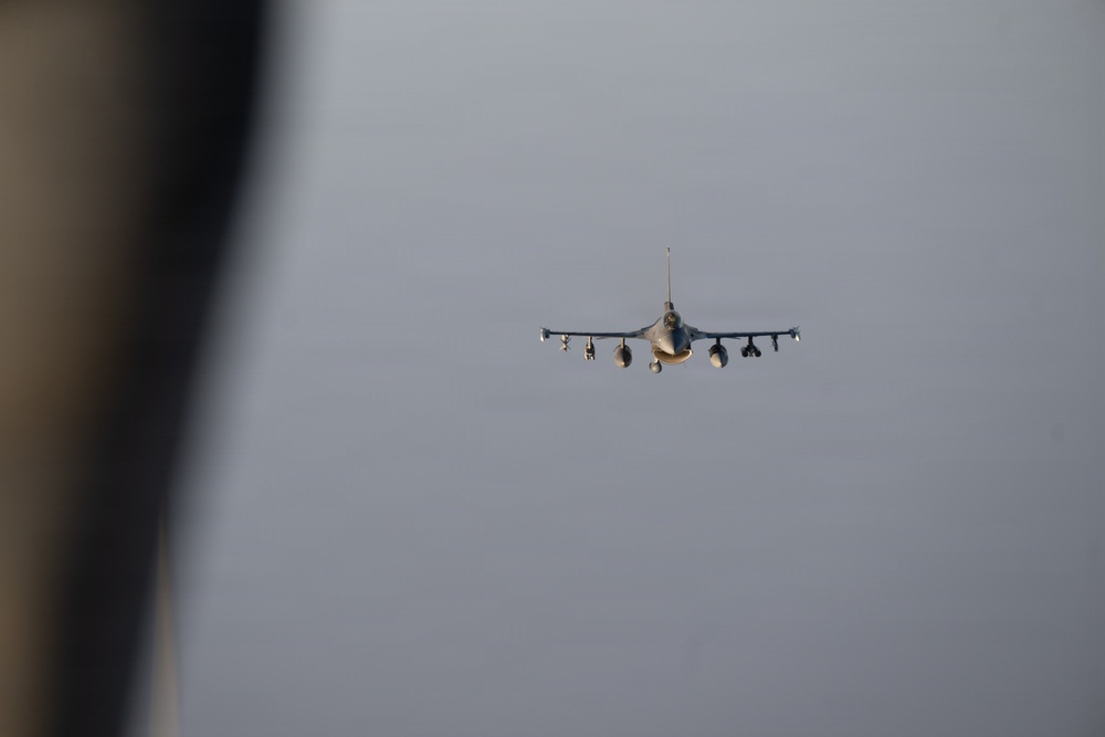 KC-135 refuels F-16s in support of regional security