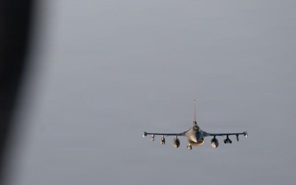 KC-135 refuels F-16s in support of regional security