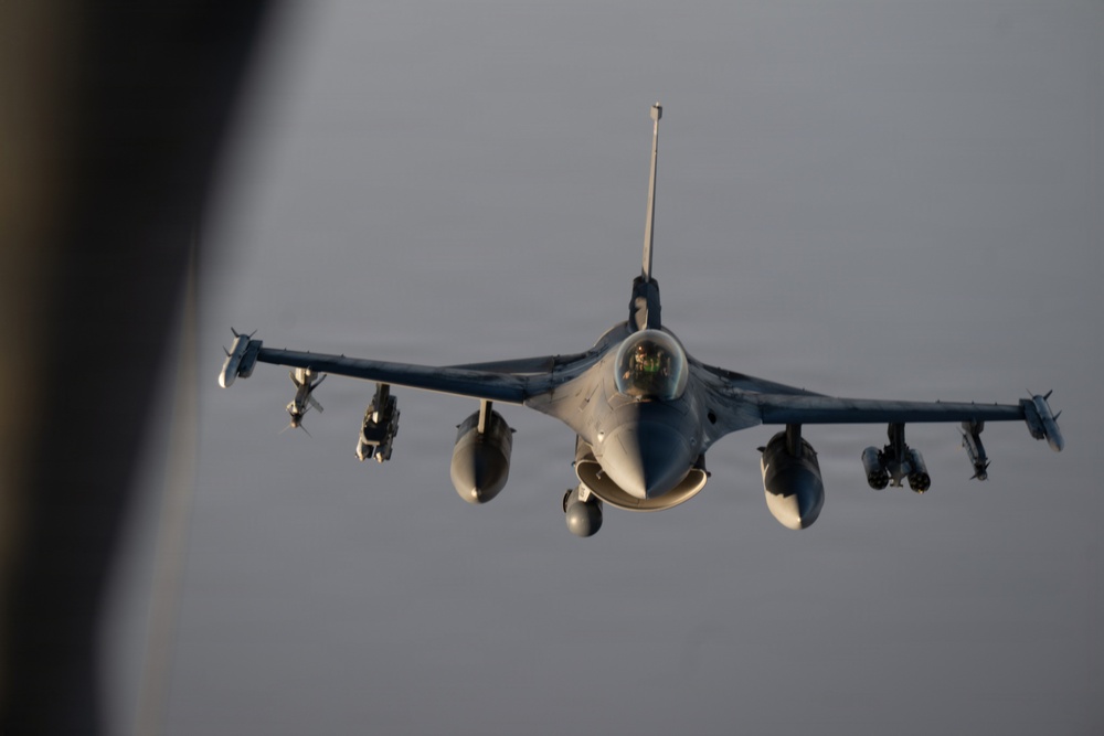 KC-135 refuels F-16s in support of regional security