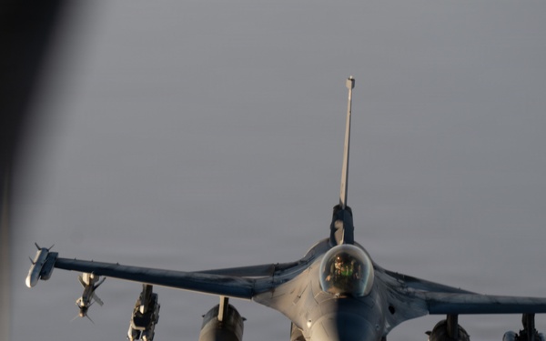 KC-135 refuels F-16s in support of regional security