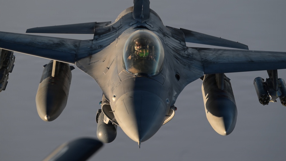 KC-135 refuels F-16s in support of regional security