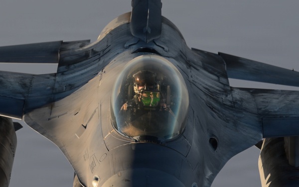 KC-135 refuels F-16s in support of regional security
