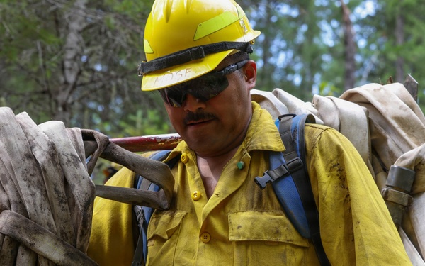 U.S. Army Soldiers from 7th Infantry Division work to suppress wildfire