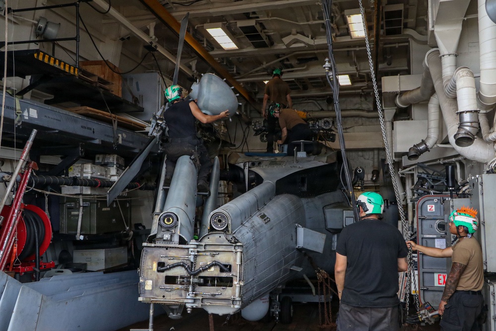 Frank E. Petersen Jr. Sailors Conduct Helicopter Maintenance