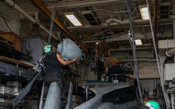 Frank E. Petersen Jr. Sailors Conduct Helicopter Maintenance