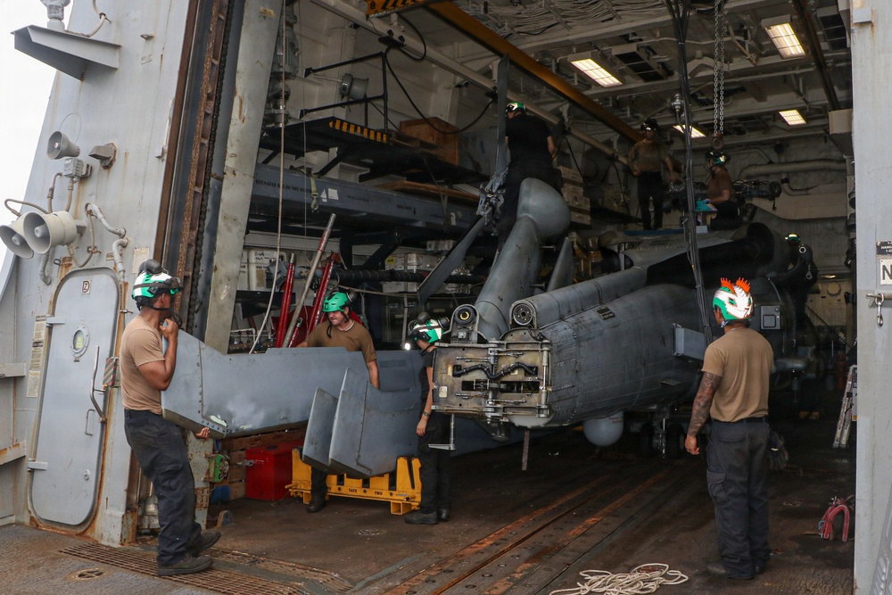 Frank E. Petersen Jr. Sailors Conduct Helicopter Maintenance