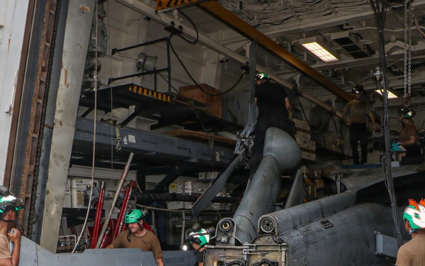 Frank E. Petersen Jr. Sailors Conduct Helicopter Maintenance