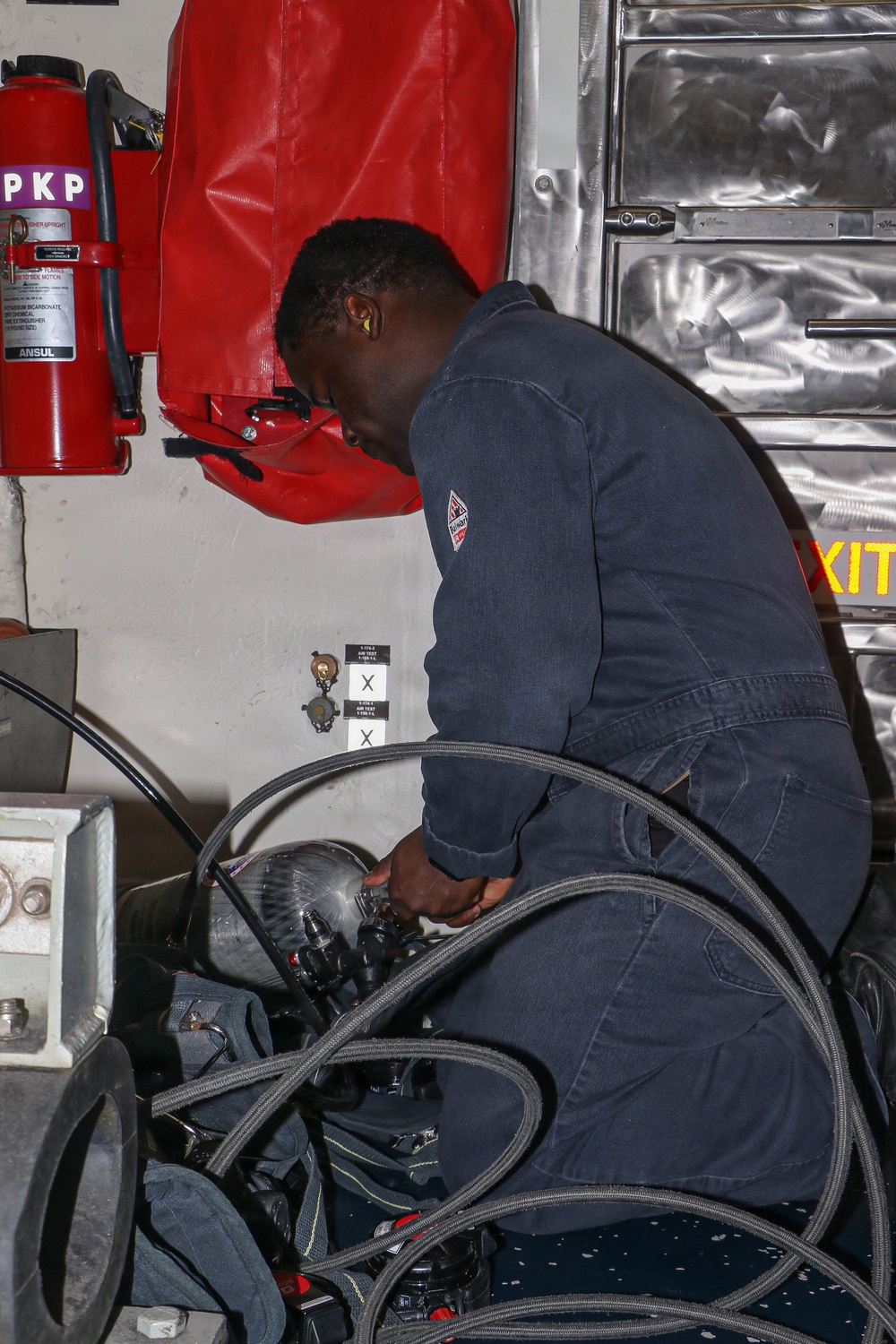 Frank E. Petersen Jr. Sailor Conducts Daily Operations