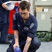 U.S. Navy Sailors conduct CPR Training evolution.