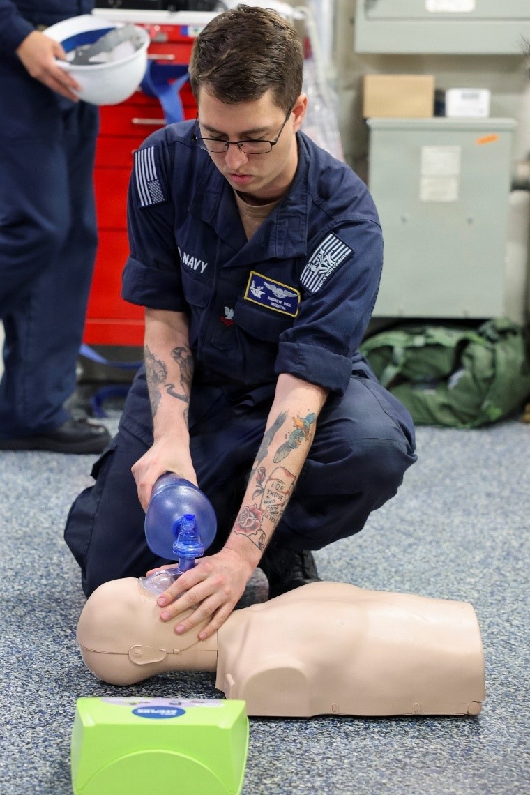 U.S. Navy Sailors conduct CPR Training evolution.
